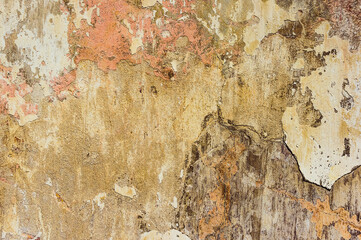 Cracked and peeling paint old wall background.