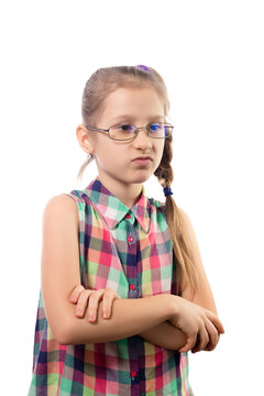 Little cute girl in glasses posing on a white background