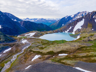 Naklejka na ściany i meble Glacial Lake at the summit of Crow Pass