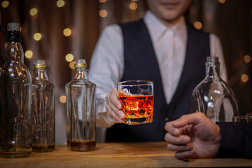 Bartender Serve Whiskey, on wood bar,