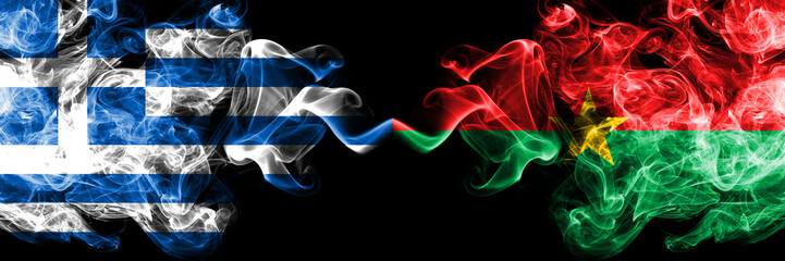 Fototapeta premium Greece vs Burkina Faso smoky mystic flags placed side by side. Thick colored silky abstract smoke flags.