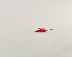 Red chili pepper on white background