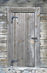 Natural wood doors in an old house. Isolated on white background