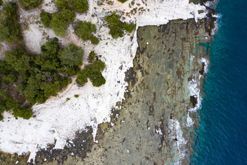 Aegean seashore and marble rocks in Aliki, Thassos island, Greece