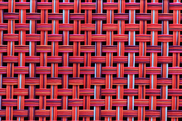 Vivid red basket weave mesh texture background