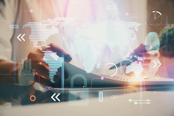 Double exposure of hands making notes with world map hologram and data theme icons. Concept of international network data.