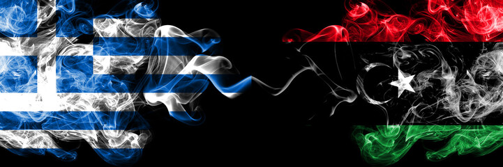 Greece vs Libya, Libyan smoky mystic flags placed side by side. Thick colored silky abstract smoke flags.