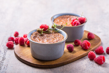 Rice pudding. French milk rice dessert with raspberries