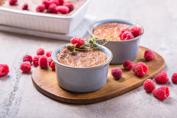 Rice pudding. French milk rice dessert with raspberries