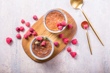 Rice pudding. French milk rice dessert with raspberries