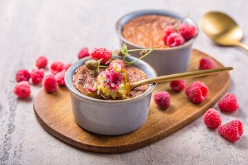 Rice pudding. French milk rice dessert with raspberries