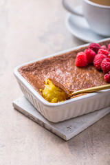 Rice pudding. French milk rice dessert with raspberries