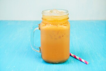 Iced milk tea in a glass of beverage