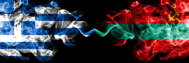 Greece vs Transnistria smoky mystic flags placed side by side. Thick colored silky abstract smoke flags.