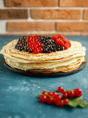 Pancakes. Stack of pancakes topped with berry jam. Breakfast.