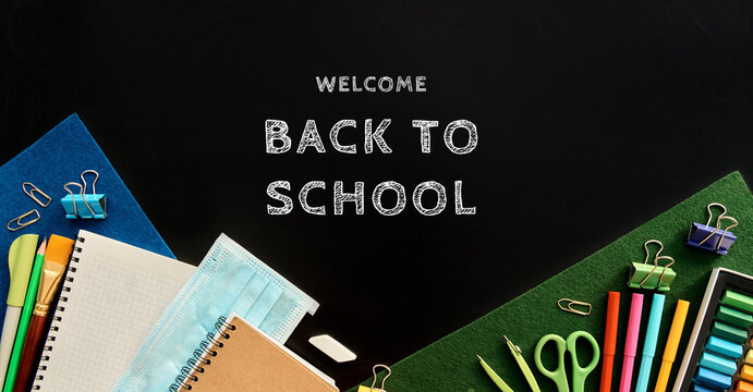 Stationery set on black background. School supplies top view for advertising and promotional items. Back to school concept - Powered by Adobe