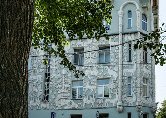 Obraz na płótnie Canvas The profitable house of the Trinity Church community on Gryazeh was built on Chistoprudny Boulevard, not far from the Church itself. Its unique feature is the terracotta reliefs that adorn the facade