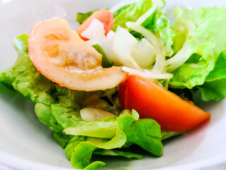 Delicious fresh salad and olive oil