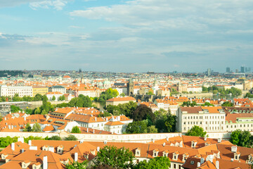 Obraz premium Houses with traditional red roofs in Prague Old Town Square in the Czech Republic