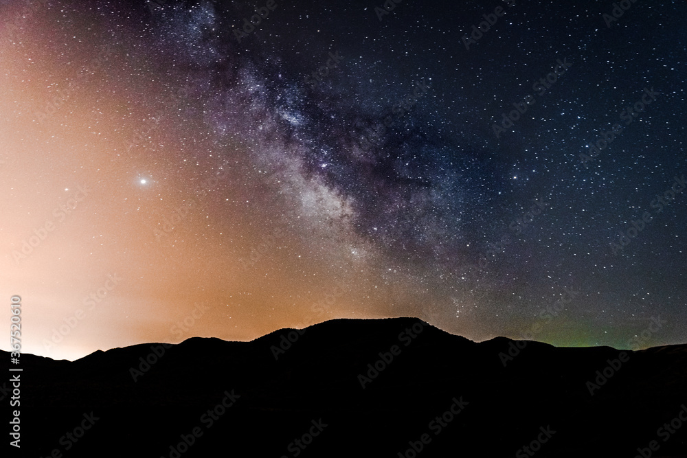 Wall mural milky way in the night sky