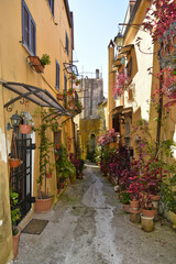 A narrow street between the old buildings of Venafro, a medieval village in the Molise region.