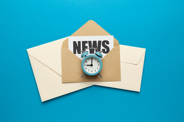 Morning e-mail newsletter. Envelopes and clock on blue background.