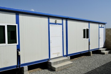 Portacabin, porta cabin, temporary labours camp , Mobile building in industrial site or office container Portable house and office cabins. Labor Camp. Porta cabin. small temporary houses