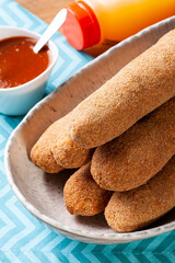 .Breaded and fried chicken skewer. Typical Brazilian snack.