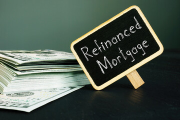 Refinanced Mortgage is shown on the conceptual business photo