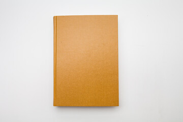 Gold color blank book on white background 
