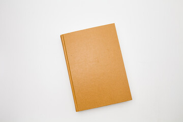 Gold color blank book on white background 