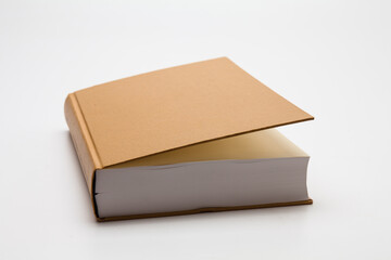 Gold color blank book on white background 