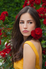 beauty portrait in a rose garden - 367528020