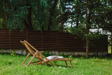 Wooden Deck Chair Under The Tree