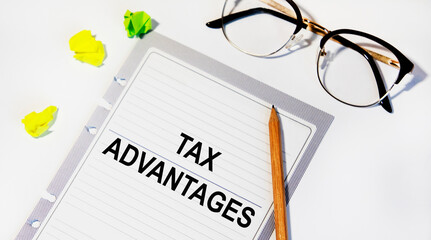 Financial concept meaning Tax advantage with sign on the piece of paper.