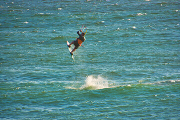 Kite surfer in the waves on Blouberg Beach, Western Cape, South Africa