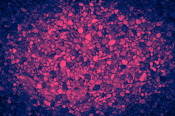 Pile of small stones background texture with colorful pink and blue duotone effect