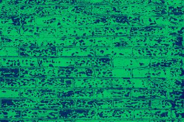 Old brick wall building exterior background texture with colorful green and blue duotone effect
