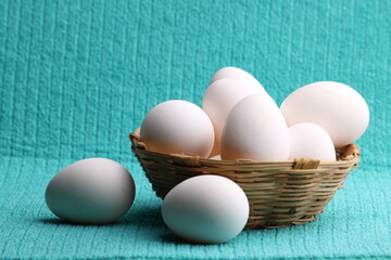 chicken eggs on a colored background. Farm products, natural eggs.