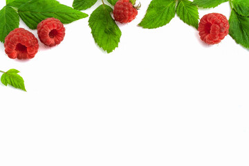 Ripe raspberries isolated on white background close-up. Beautiful red fresh raspberries with leaves along the contour on the table. Top view. Banner for the site. Free space for text