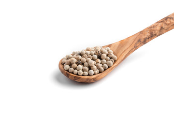 Isolated white pepper in the wooden spoon