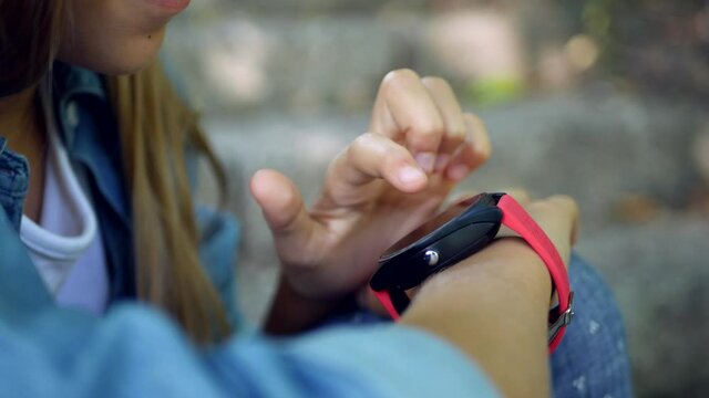 Smart Watch, Kid Using Smartwatch Outdoor in Park, Child Talking at Smartphone, Gilr Playing on Device
