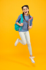 There is time for study and fun. Happy kid jump yellow background. Enjoying holidays. School holidays. Day out. Summer vacation. School is out for holidays