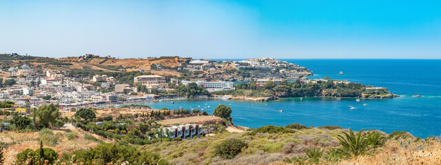 Agia Pelagia is a small town with a beautiful beach at Bay Aghia Pelaghia near Heraklion, Crete, Greece. Panoramic view HD Agia Pelagia. Travel and holidays places.