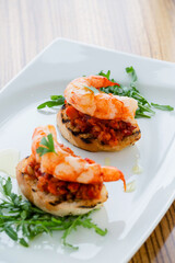 bruschette shrimps on plate