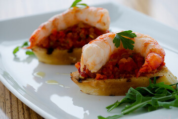 bruschette shrimps on plate