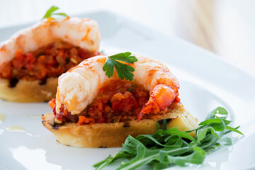 bruschette shrimps on plate