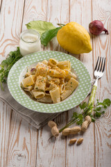 pasta with cram sauce lemon peel peanuts and parsley