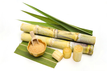 sugar cane and brown sugar on white isolate background