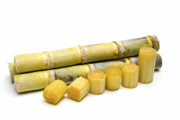 sugar cane and brown sugar on white isolate background